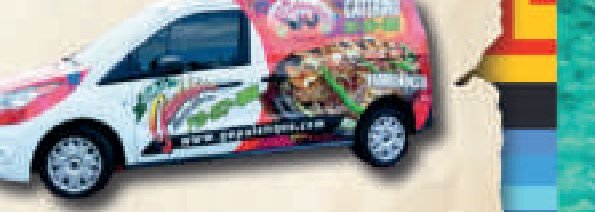The El Palenque catering van, wrapped with the restaurant logo and both location addresses