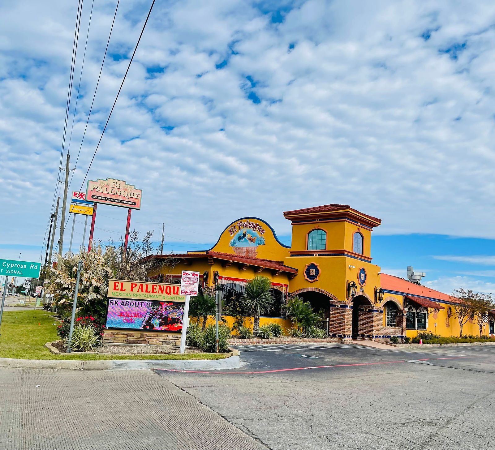 El Palenque Spring on Spring Cypress Road, with the roadside sign out front